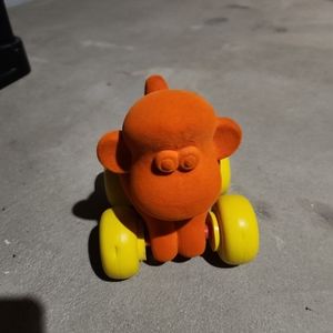Rubbabu Monkey Big Animal on Wheels Kids Toy, Orange.